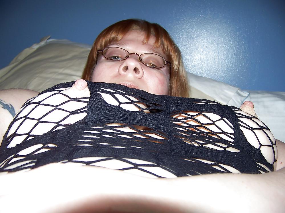 23P Sexy in Black Net Dress with Garter Hose and Glass Toy
