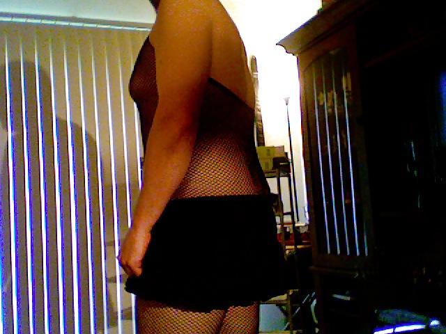 9P Black fishnet body suit.