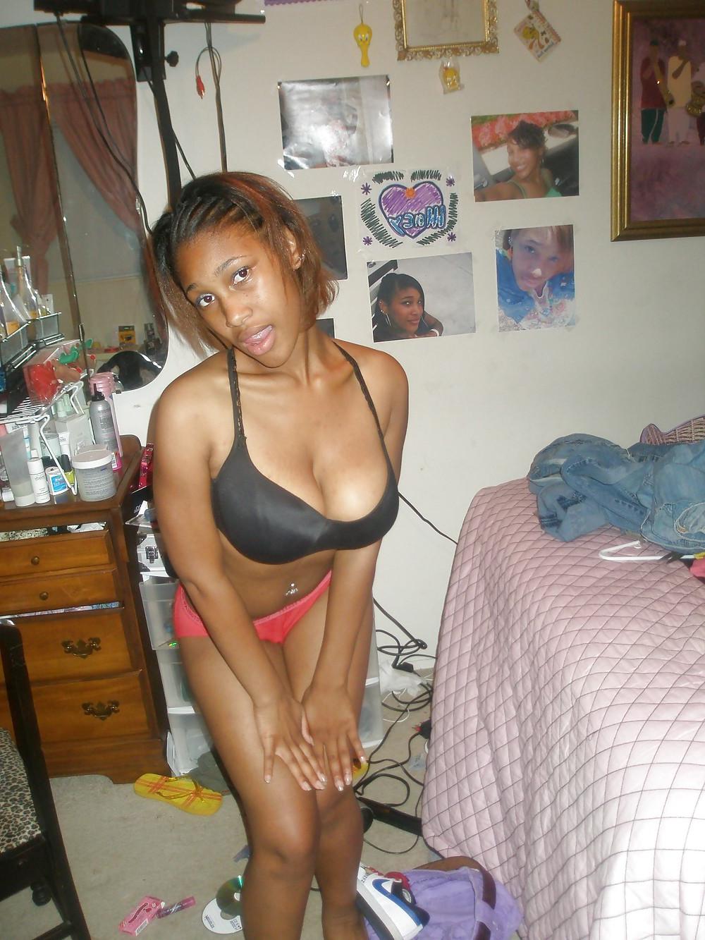 12P Pretty Ebony Teen In Bedroom Showing Huge Tits