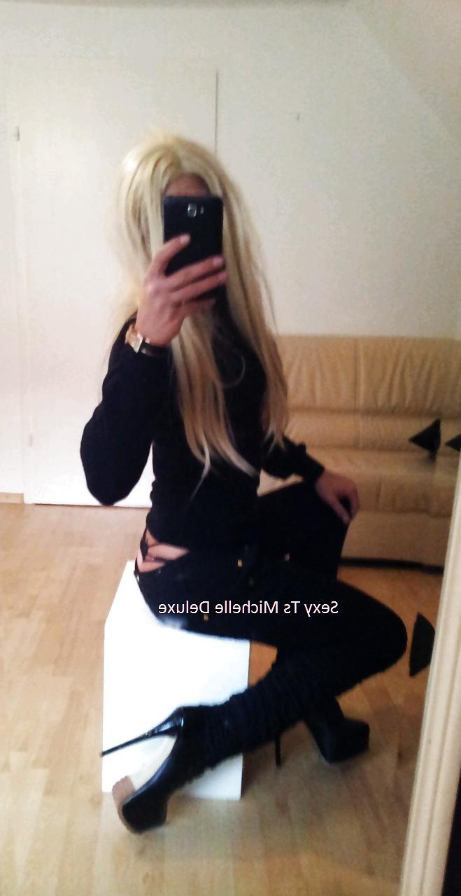 25P Blonde in black mini dress michelle deluxe