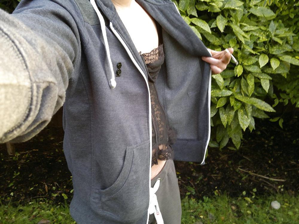 4P In the woods with a black corset on.