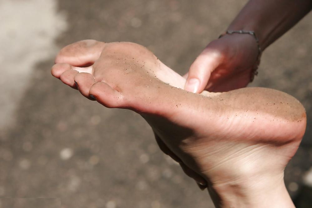22P Girls  bare dirty feet  outdoor