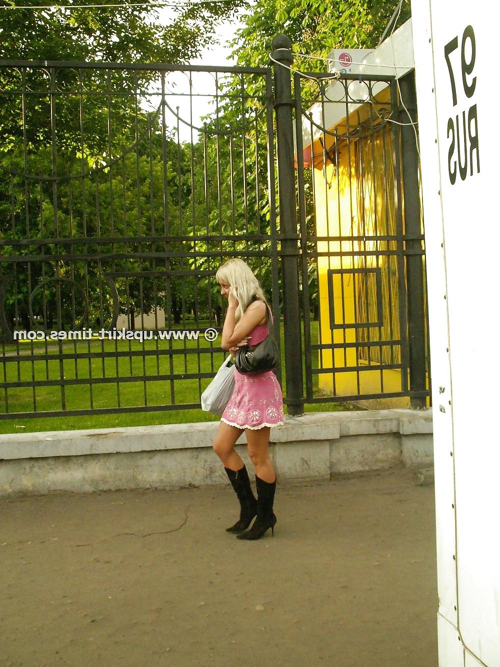 9P Tanned blonde in a short pink dress and thong