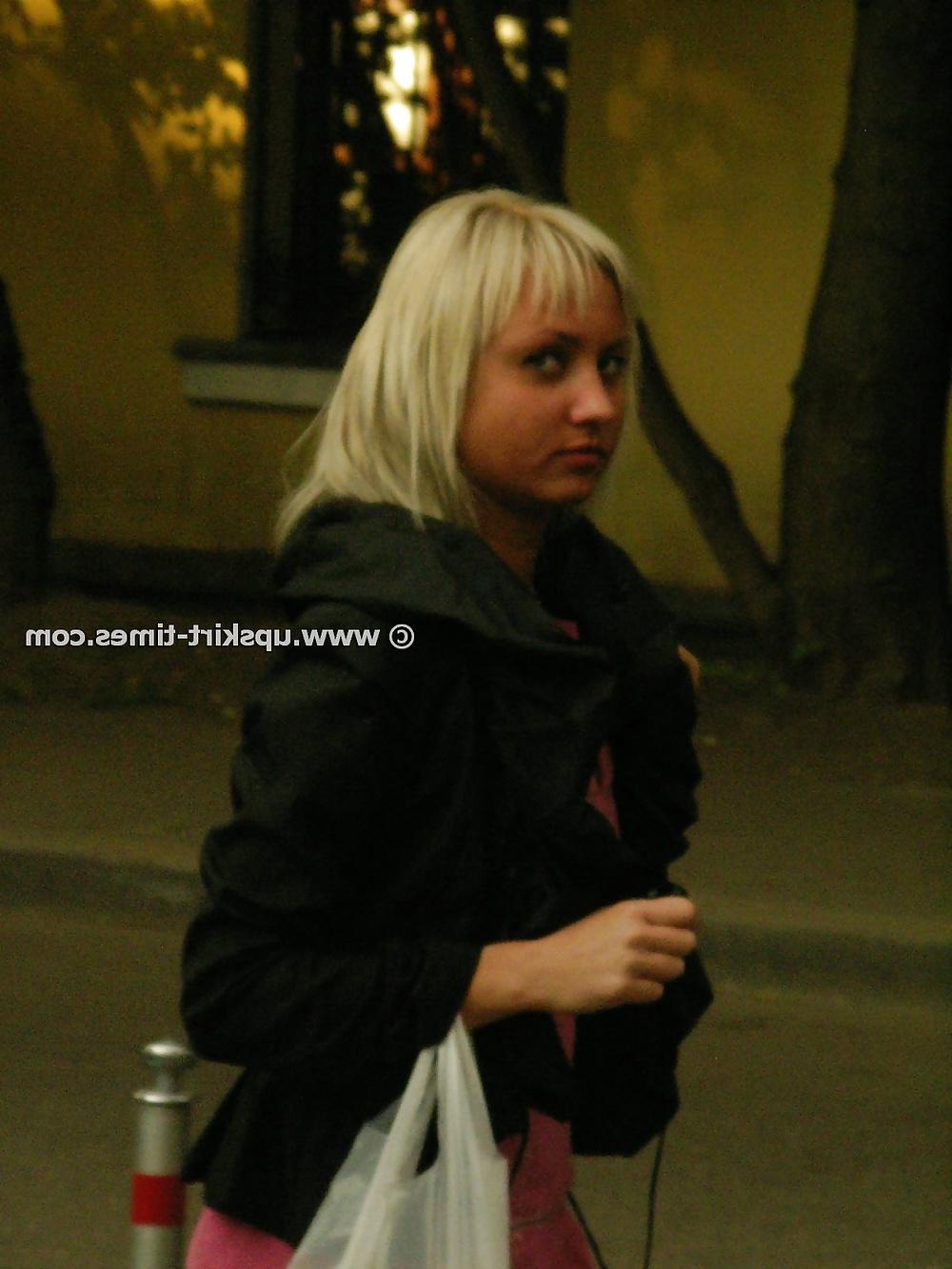 9P Tanned blonde in a short pink dress and thong