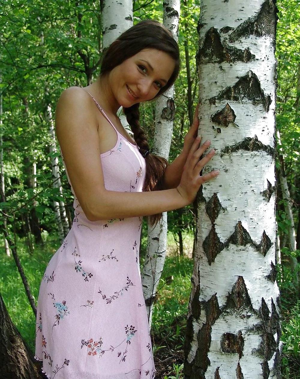 25P Sweet brunette in forest