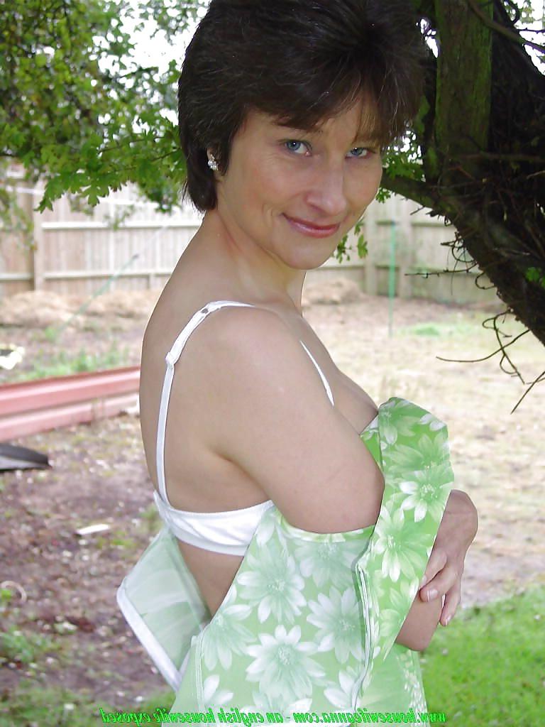 23P Mature Anne wears white panties and pantyhose.
