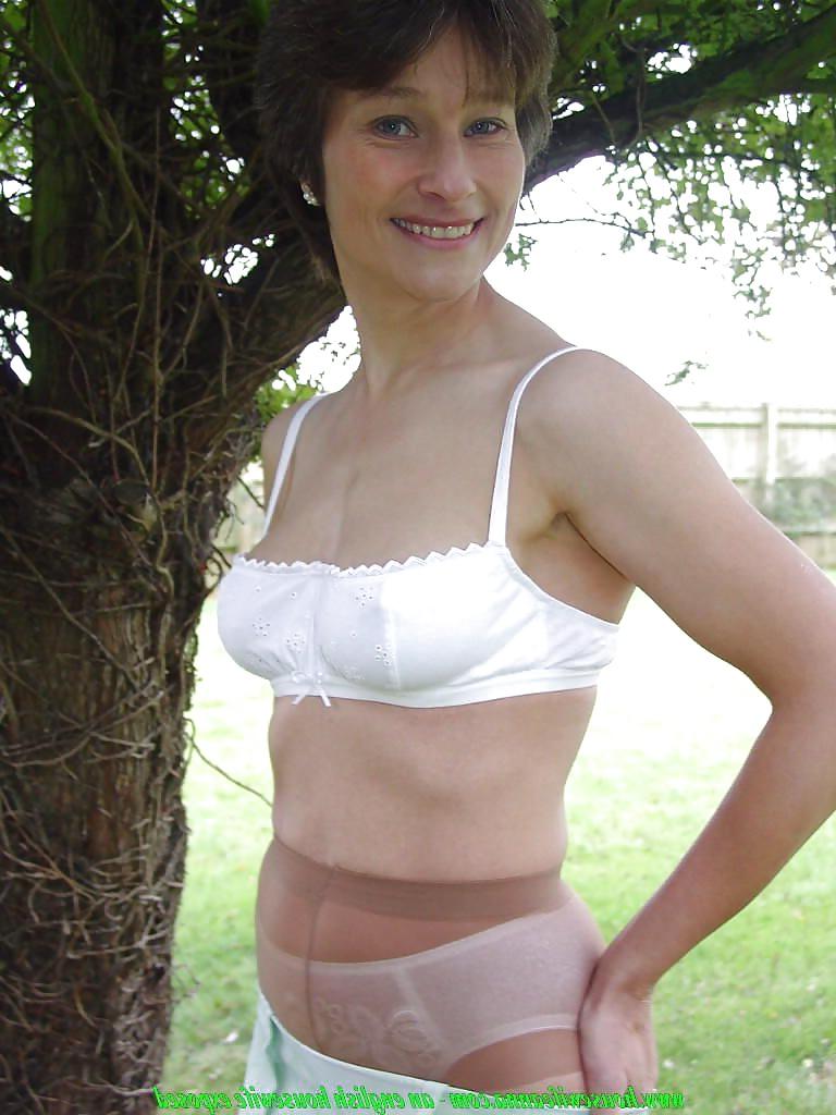 23P Mature Anne wears white panties and pantyhose.