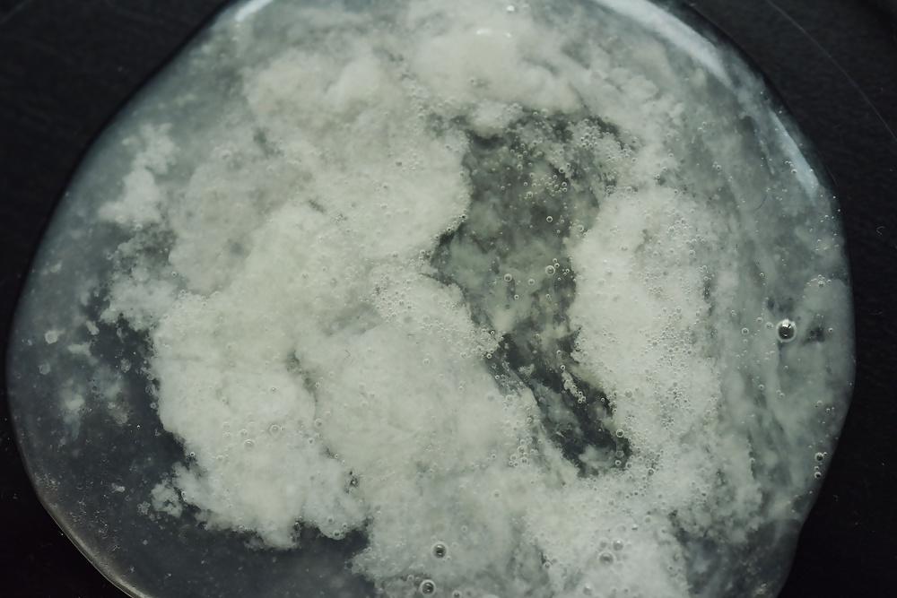 17P Precum and Cum dripping out of condoms (closeup)