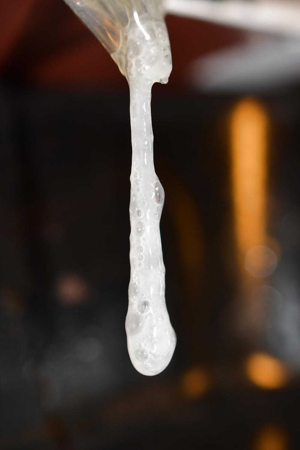 17P Precum and Cum dripping out of condoms (closeup)