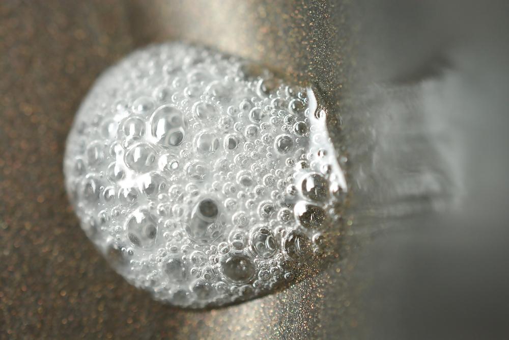 17P Precum and Cum dripping out of condoms (closeup)