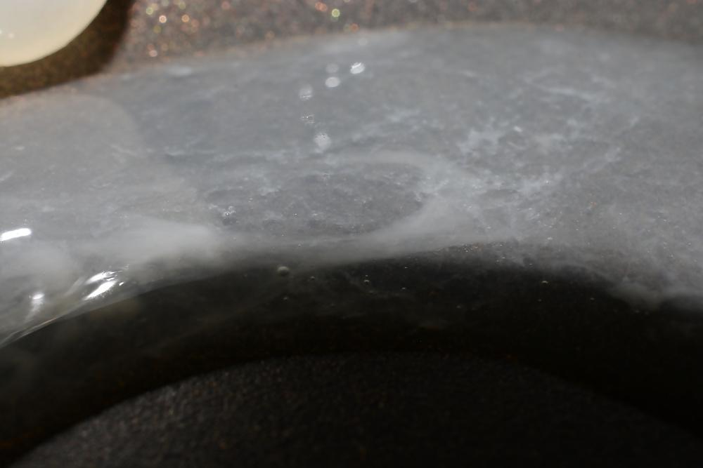 17P Precum and Cum dripping out of condoms (closeup)