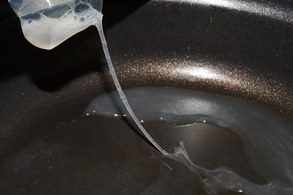 17P Precum and Cum dripping out of condoms (closeup)