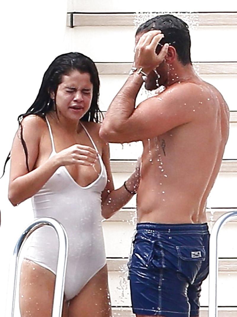 5P Selena Gomez swimsuit pokies