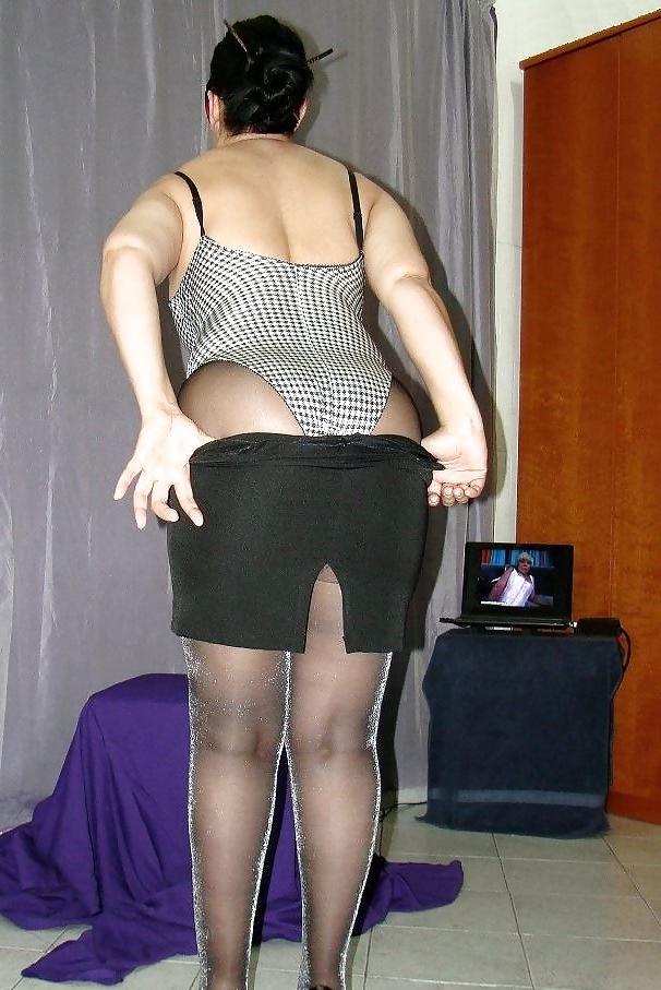 9P Sexy secretary dressed in a swimsuit