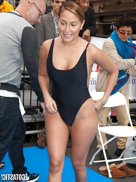 12P Adrienne Bailon in Swimsuit