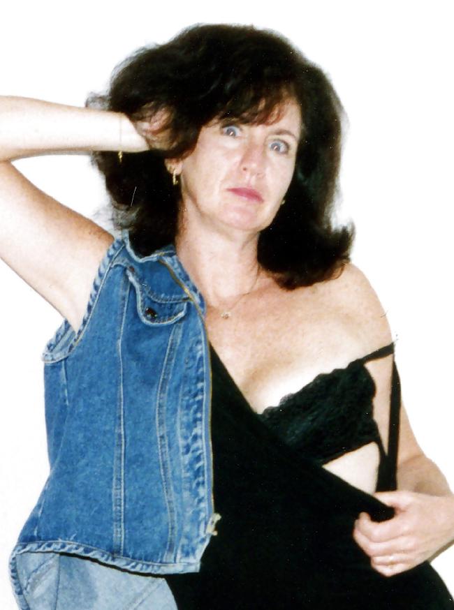 25P Lady T Bondage at a party in black dress.