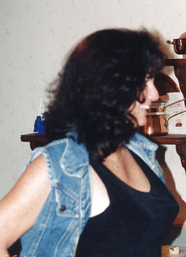 25P Lady T Bondage at a party in black dress.