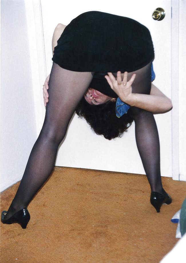 25P Lady T Bondage at a party in black dress.