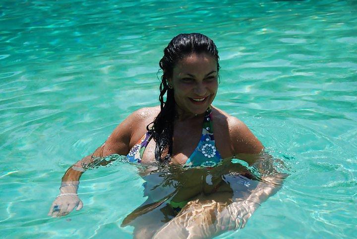 20P Busty milf in bikini and dressed like a slut