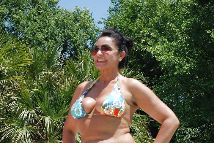 20P Busty milf in bikini and dressed like a slut