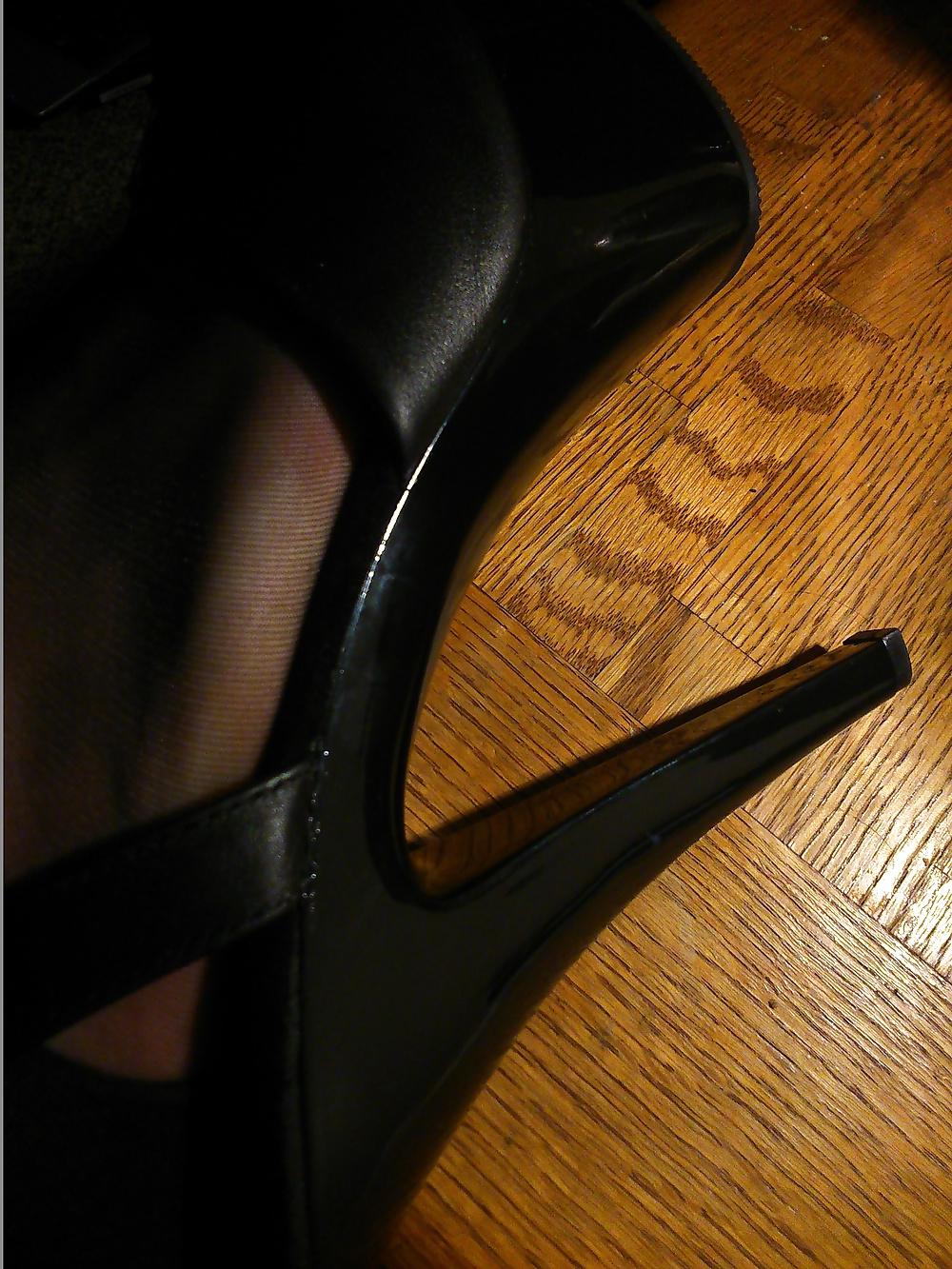 14P Feet In Black Stockings, Leather High Heels And Blue Polish
