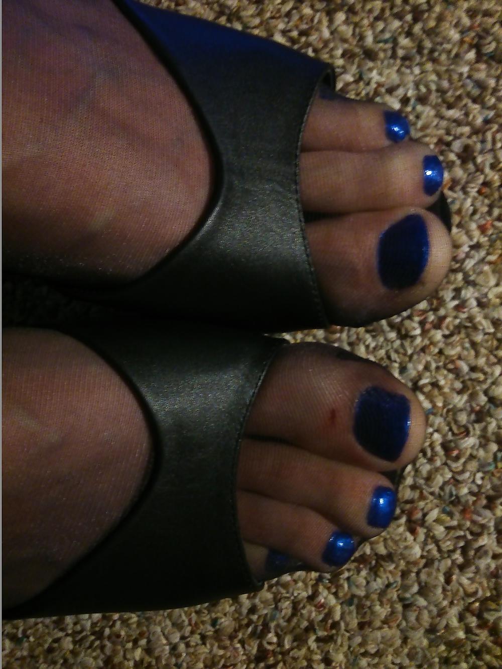 14P Feet In Black Stockings, Leather High Heels And Blue Polish