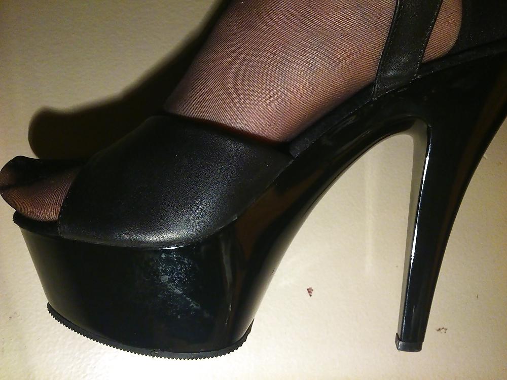 14P Feet In Black Stockings, Leather High Heels And Blue Polish
