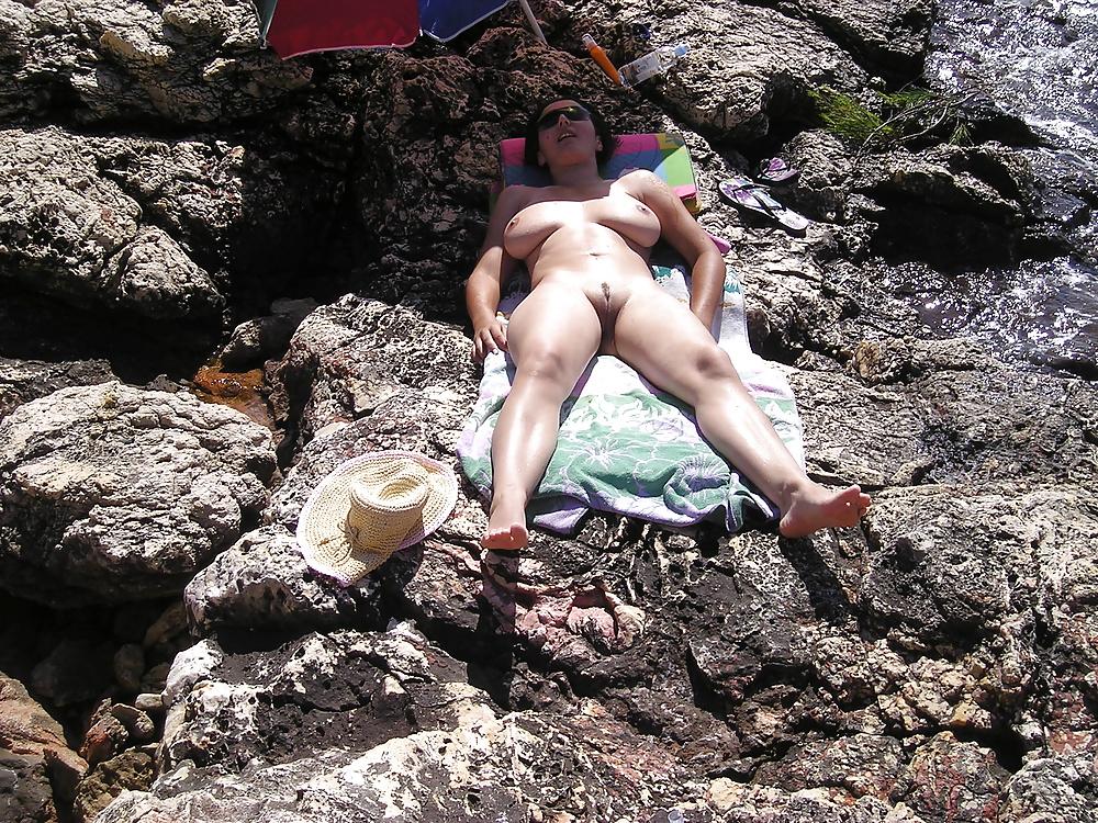 25P Busty milf on beach 2