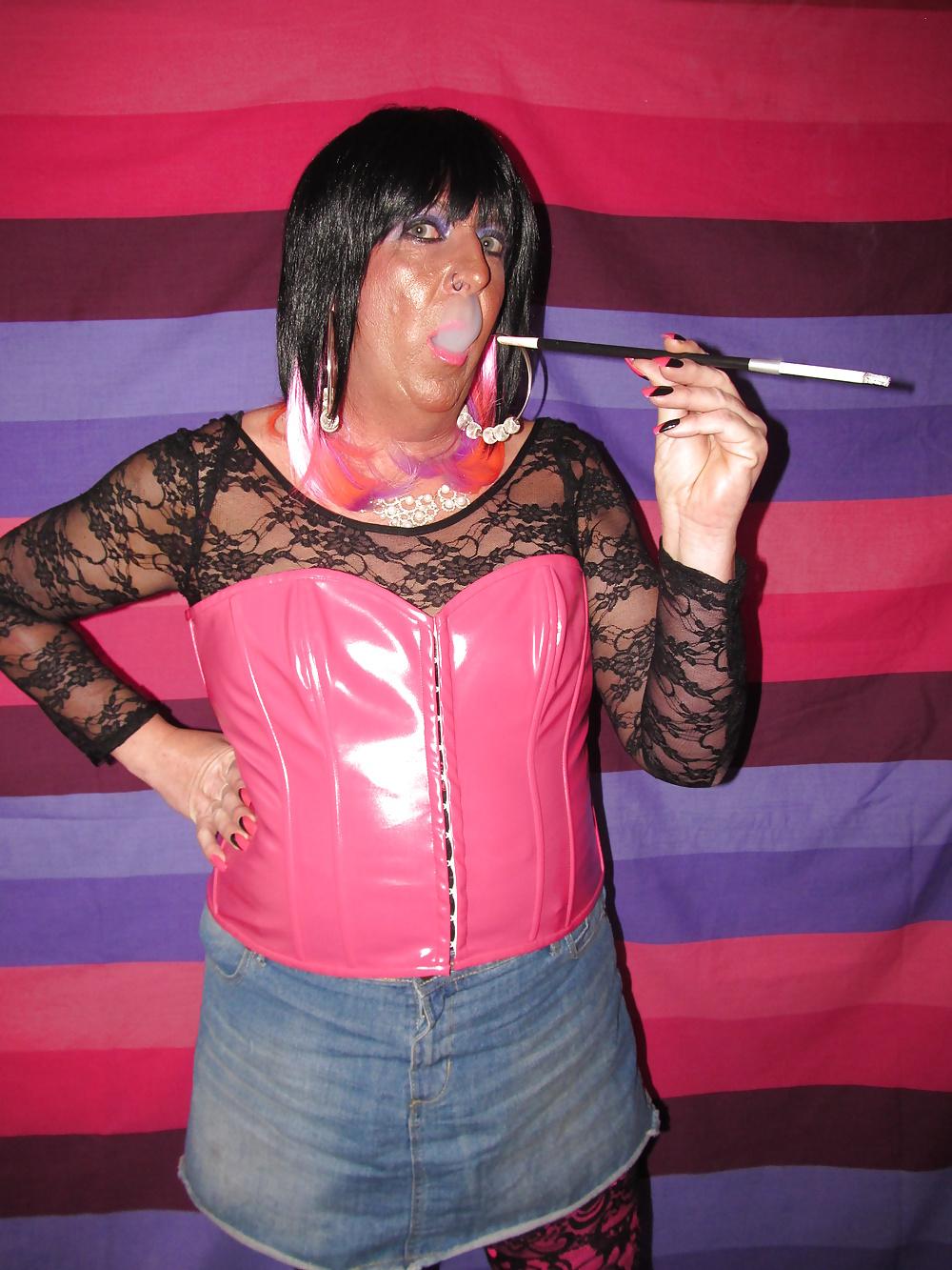 14P Chrissie in her new pink PVC corset 