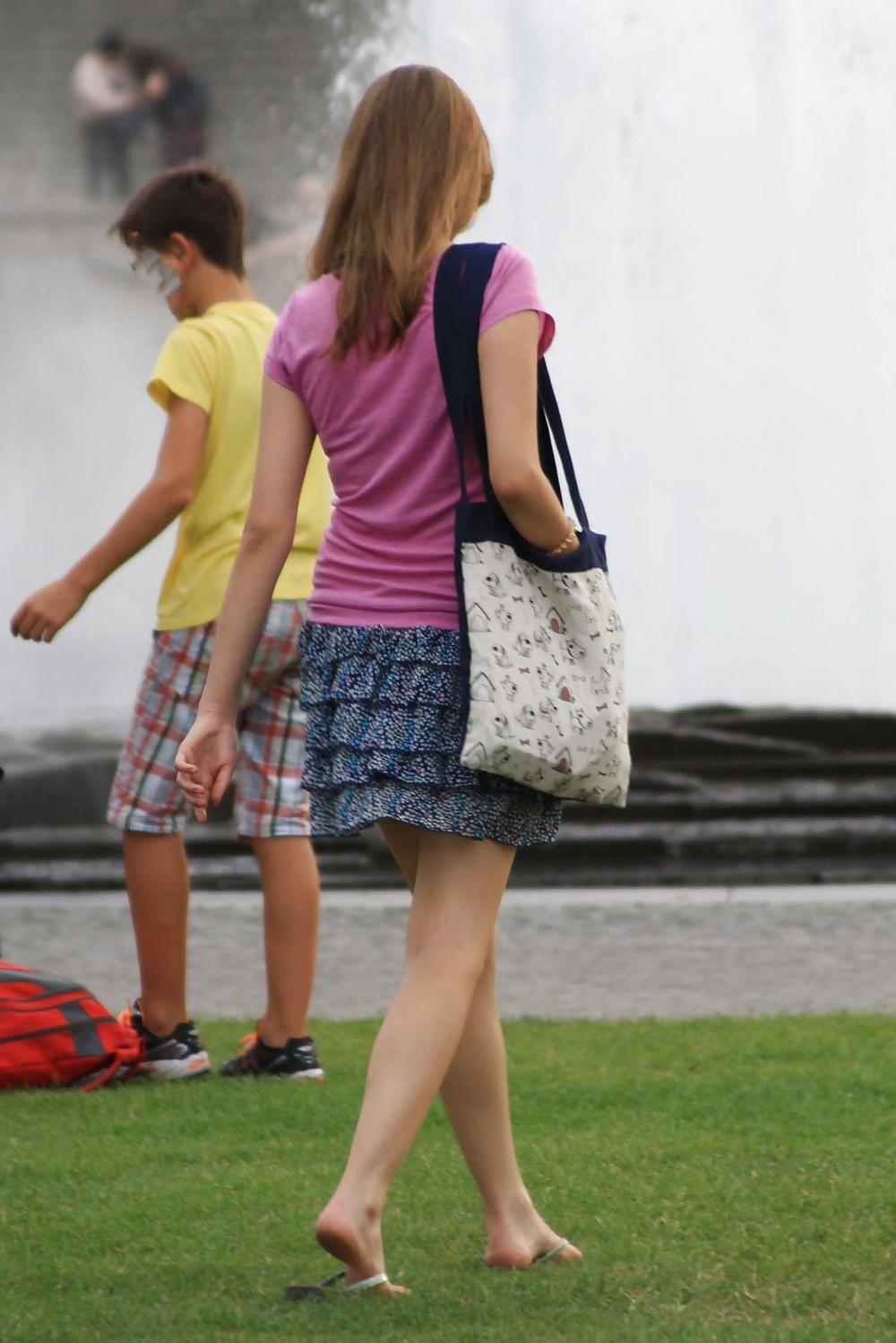 9P Skinny brunette girl with blue skirt