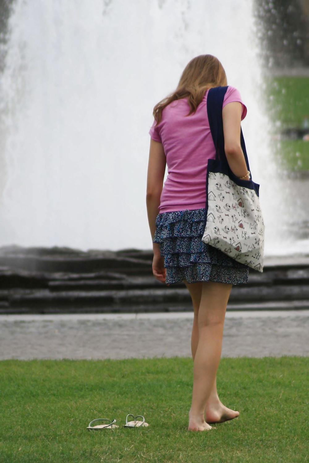 9P Skinny brunette girl with blue skirt