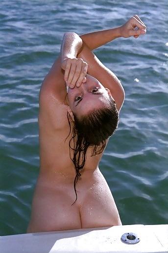 12P Brunette Audra posing on a boat