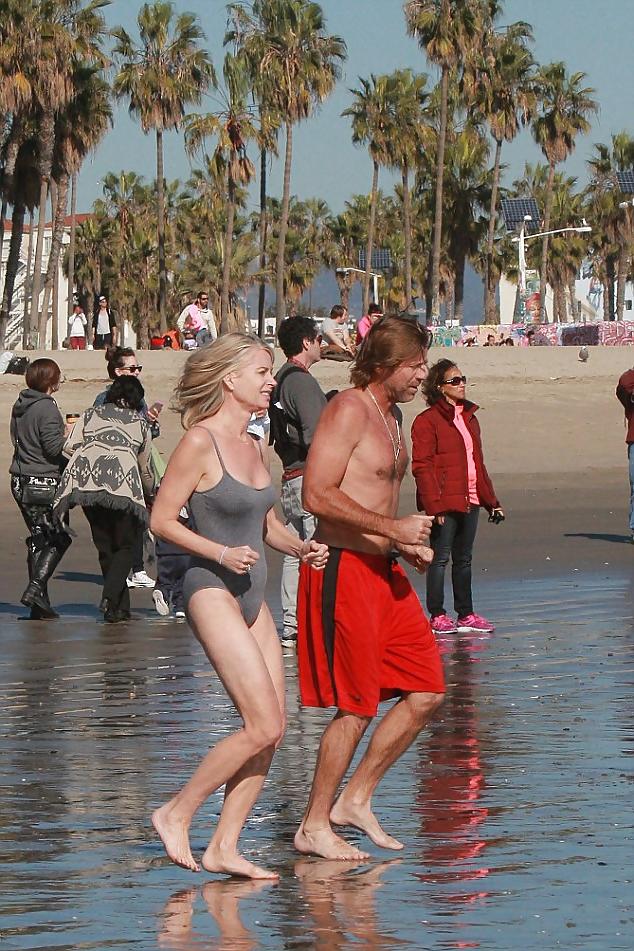 11P Candid mature beach swimsuit
