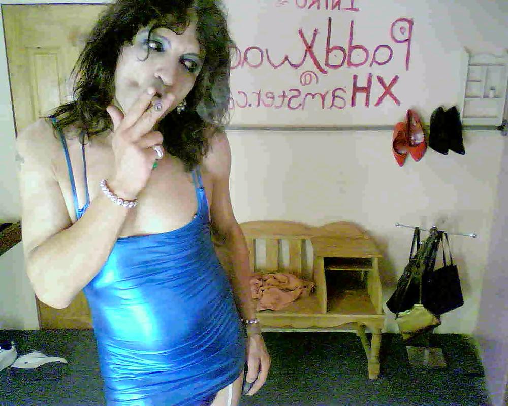 25P Metalic blue mini dress and a Cuban Cigar