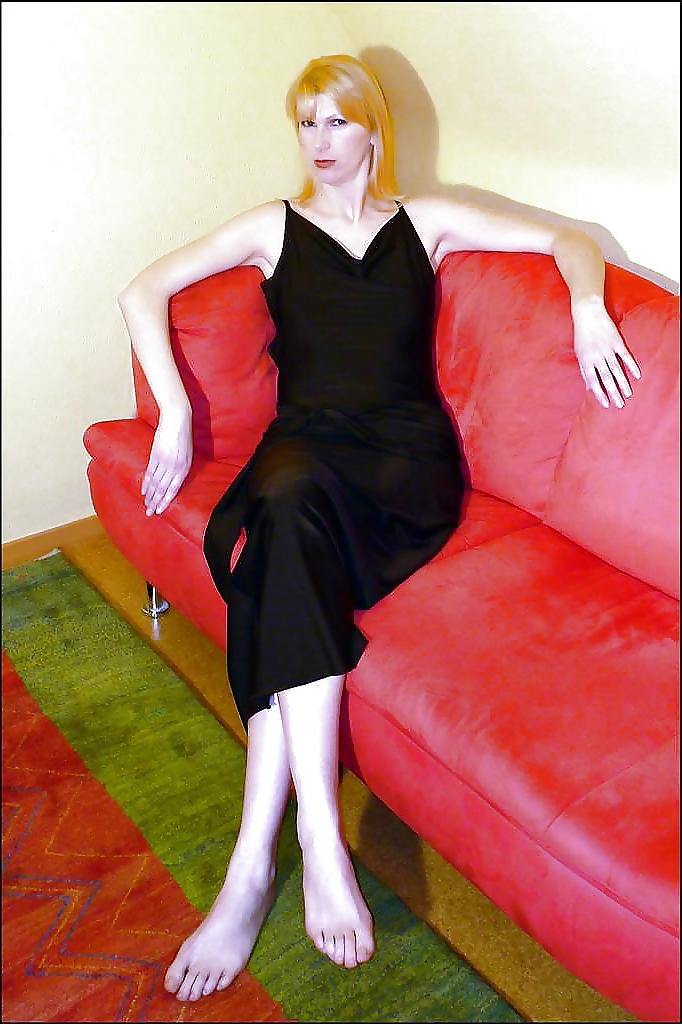 12P Barefoot slut Anja takes off her dress