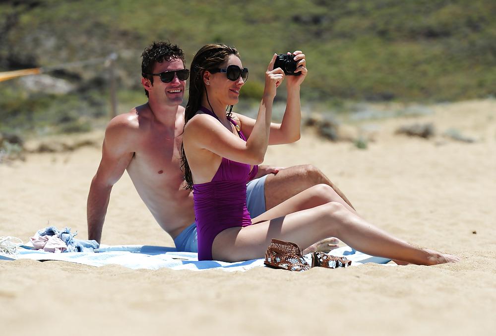 25P Kelly Brook in purple swimsuit on holiday