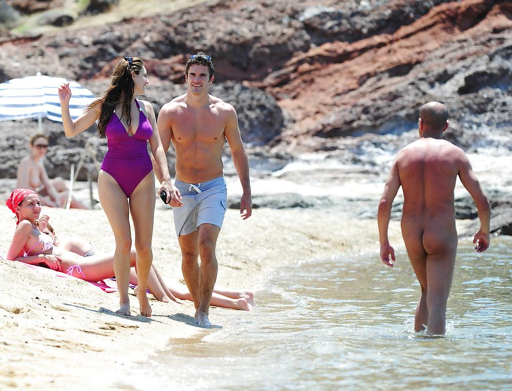 25P Kelly Brook in purple swimsuit on holiday