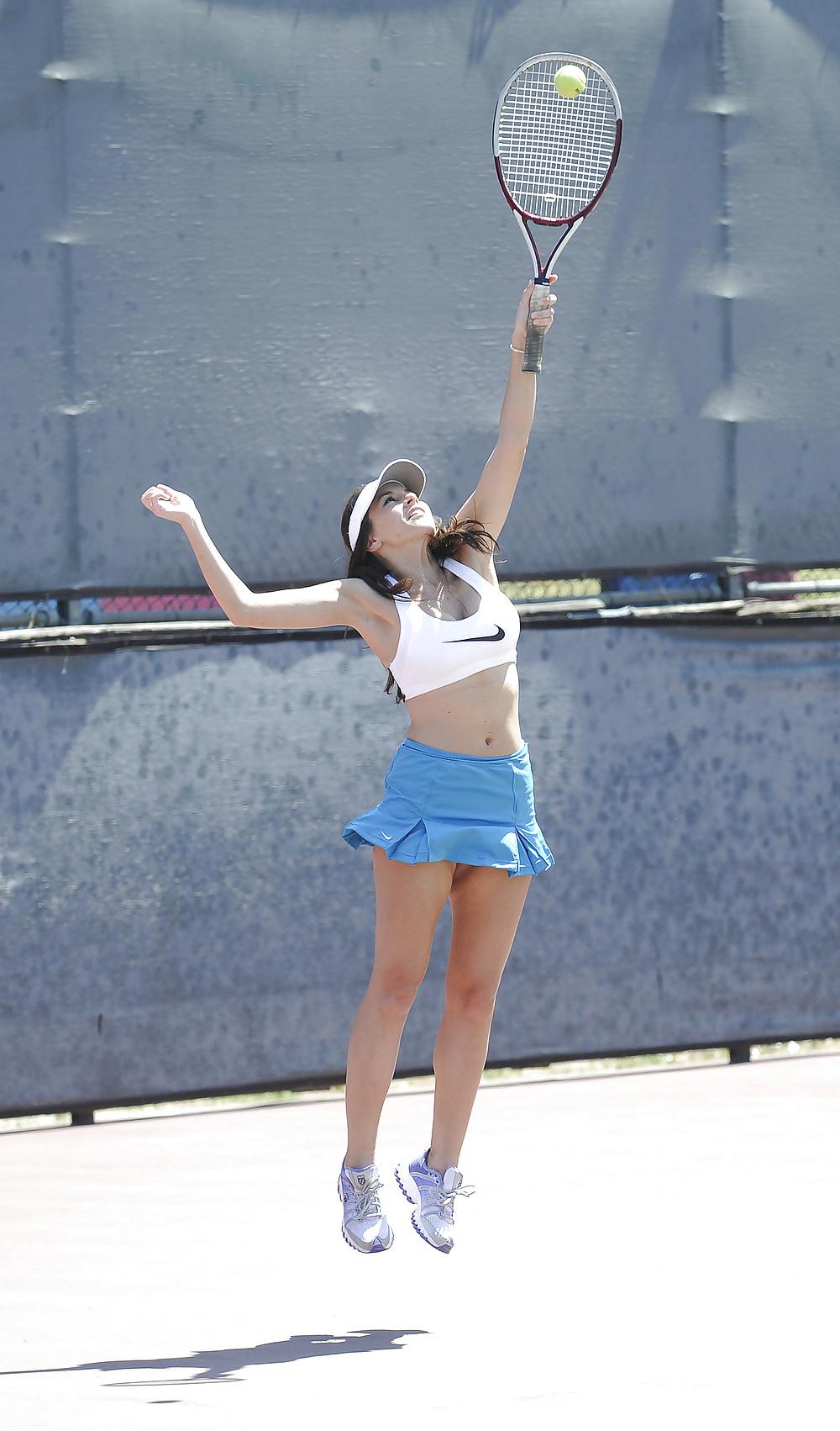 12P Imogen Thomas showed off a little skin as she plays tennis