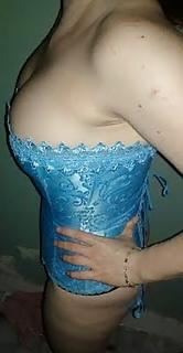 22P MILF  tits in a corset.