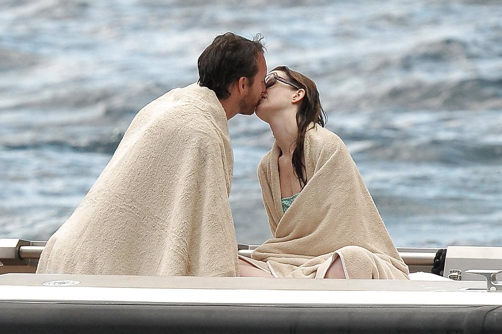 10P Anne Hathaway - swimsuit on vacation in Italy