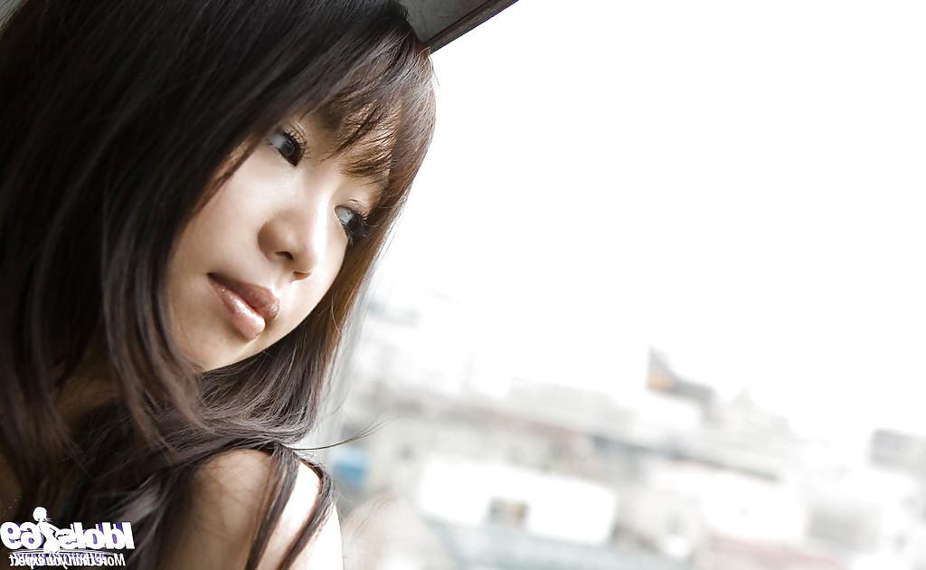 15P Busty asian babe on high heels Mai Nadasaka stripping off her clothes