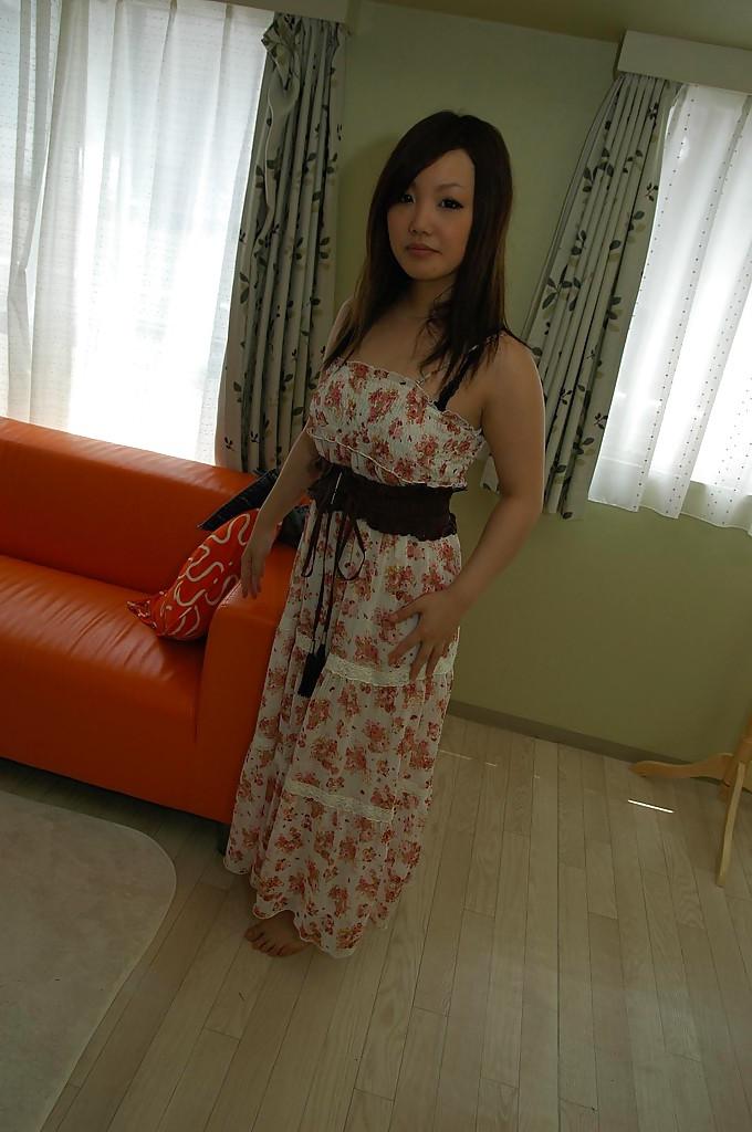 16P Asian sweetie Nagisa Matsui slipping off her dress and lingerie