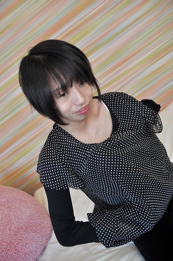16P Beauty with small boobies Masumi Miyaji is stretching her snatch