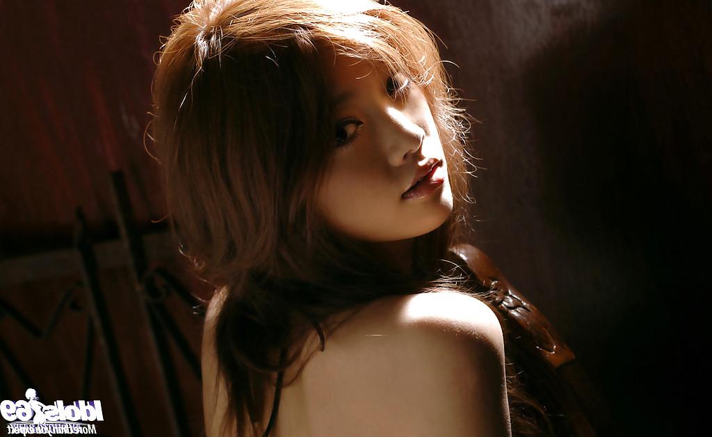 15P Foxy asian babe with tiny tits Mai Kitamura slipping off her lingerie top