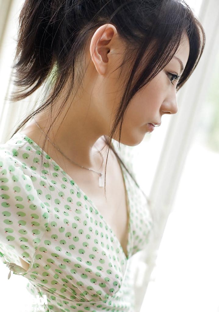 16P Pretty asian teen babe Takami Hou stripping off her dress