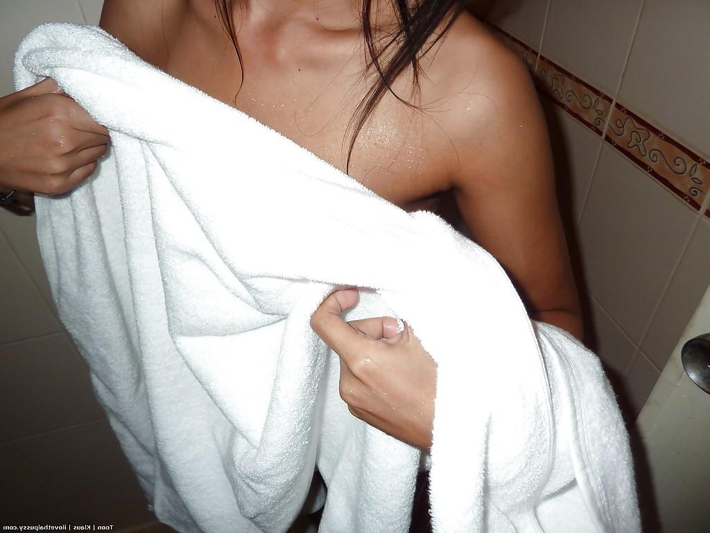 16P Asian babe with shaved twat giving a blowjob and licking guy's asshole