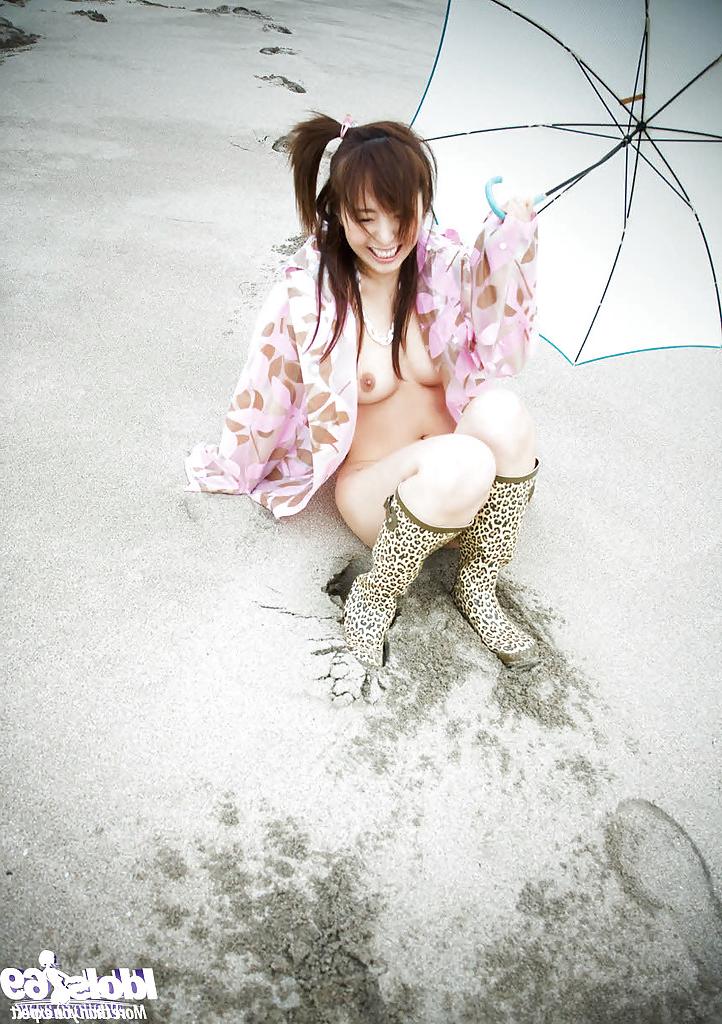 12P Young asian sweetie with sexy fanny and trimmed pussy posing outdoor