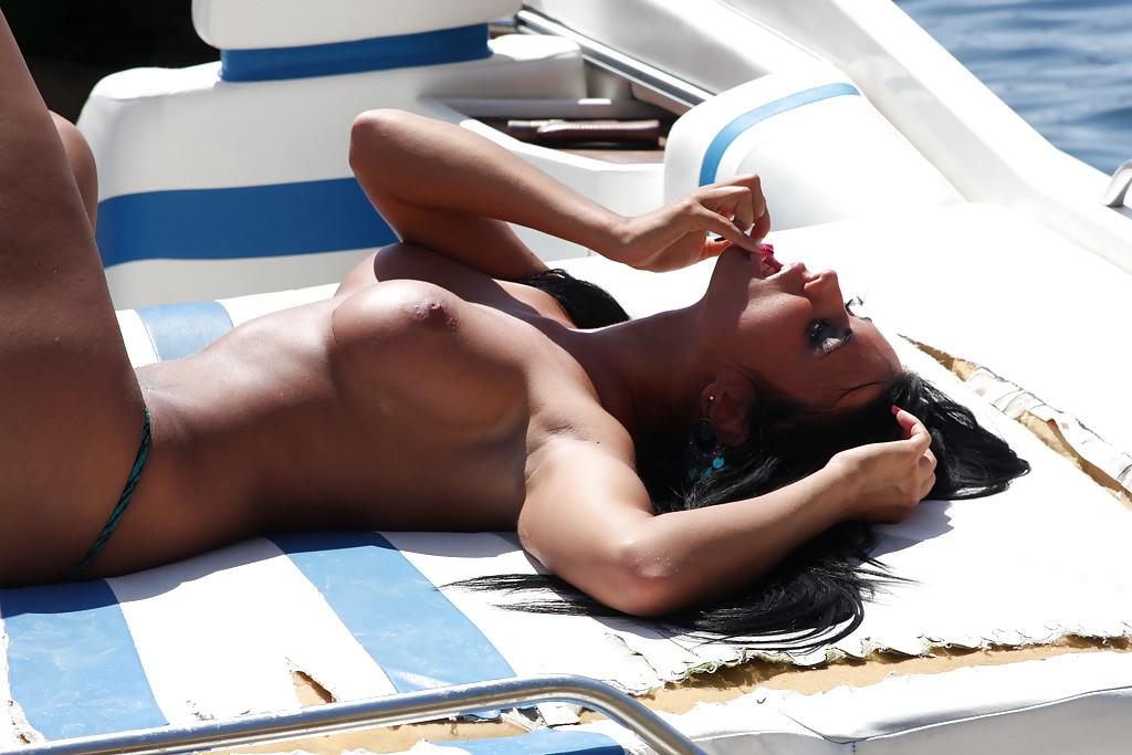 16P Pornstar babe Ashley Bulgari exposing pointy hooters on the boat