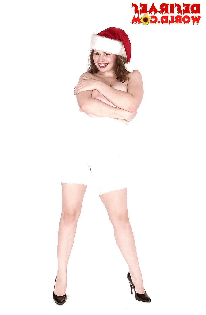 16P MILF pornstar Desirae flaunting massive tits in high heels at Christmas