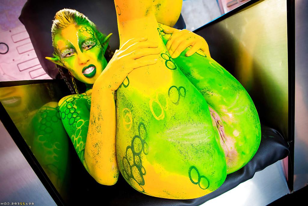 16P Kinky cosplay chick Tiffany Doll posing in body paint uniform and spreading
